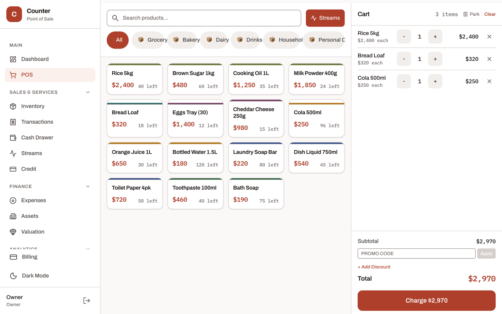 Counter's point of sale screen, with a priced product grid and a cart ready to charge